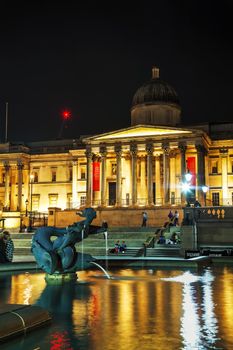 LONDON - APRIL 14: National Gallery building at Trafalgar square on April 14, 2015 in London, UK. Founded in 1824, it houses a collection of over 2,300 paintings dating from 13th century to 1900.