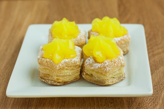 Lemon filled puff pastry dusted with powdered sugar.