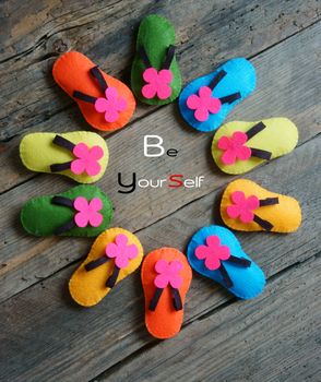 Be yourself, a message from abstract idea, group of handmade sandals in vibrant color, make from fabric, be strong, confident with your personality, an amazing concept