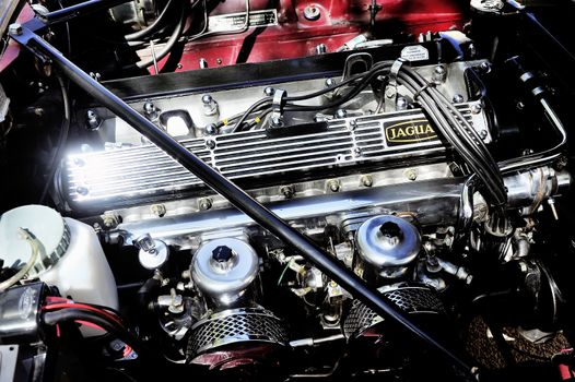 Detail of an engine Jaguar XJ photographed vintage car rally Town Hall Square in the town of Ales