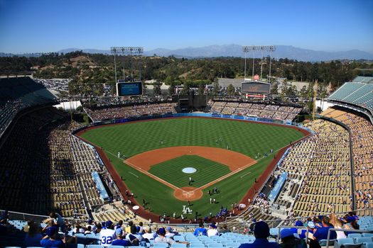 A sunny day baseball game at Dodger Stadium in Los Angeles.