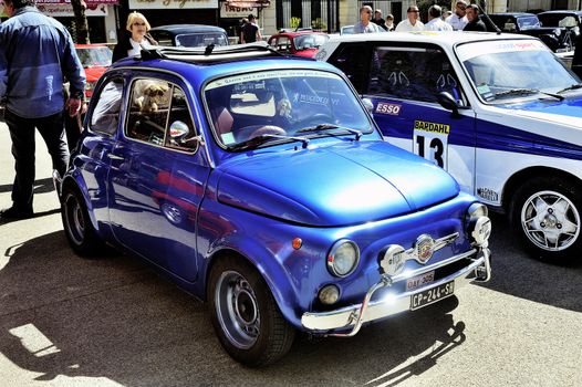Old Fiat 500 Abarth racing equipped photographed vintage car rally Town Hall Square in the town of Ales, in the Gard department