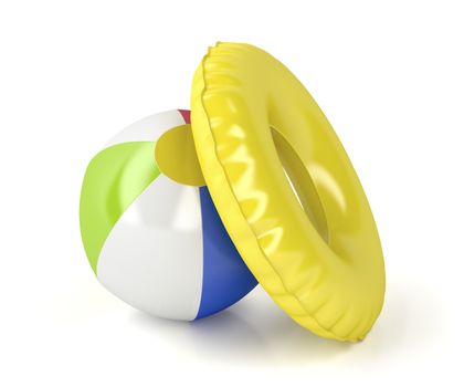 Beach ball and swim ring on white background