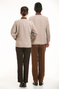 dressed in overalls who stand in front of a white background