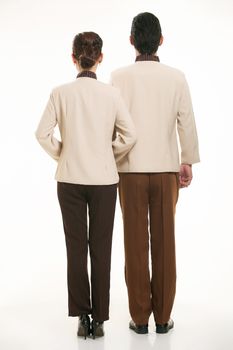 dressed in overalls who stand in front of a white background