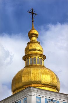 Saint Michael Monastery Spire Cathedral Kiev Ukraine.  Saint Michael's is a functioning Greek Orthordox Monasatery in Kiev.  The original monastery was created in the 1100s but was destroyed by the Soviet Union in the 1930s.  St. Michaels was reconstructed after Ukrainian independencein 1991 and reopened in 1999.