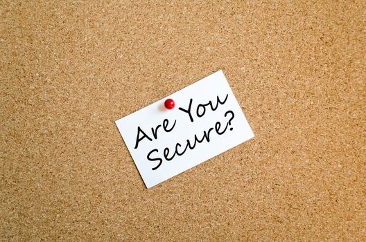Sticky Note On Cork Board Background are you secure concept