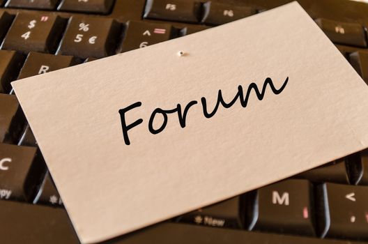 Forum Concept on black keyboard