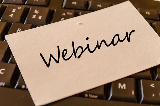Webinar Concept on black keyboard