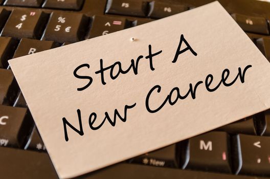 Start a new career Concept on black keyboard note