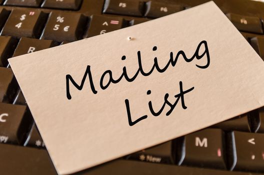 Mailing List Concept on black keyboard