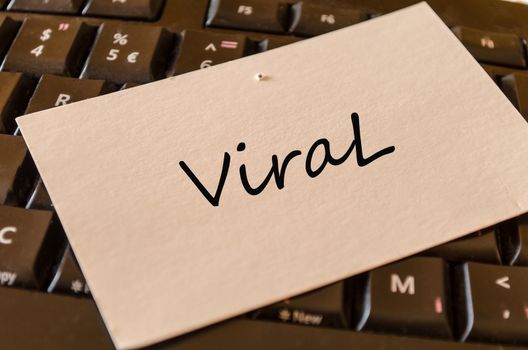 Viral Concept on black keyboard