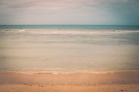 Beach sand and blue sea in Thailand vintage