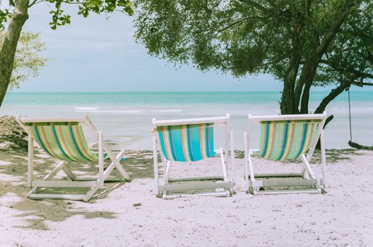 Beach colorful chair on the beach in Koh Samet Thailand vintage