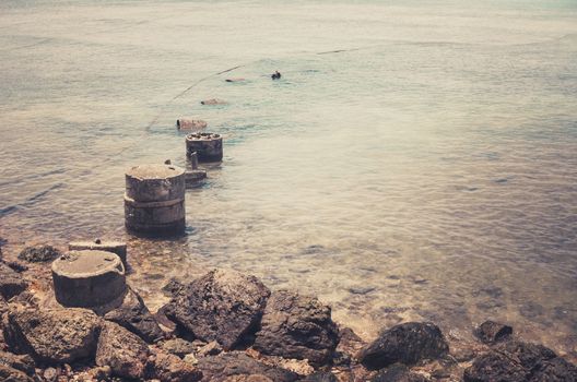 Beach rock and blue sea in Thailand vintage