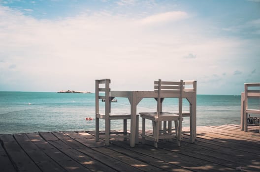 Wood dock White chair and table in Koh Samet Thailand vintage