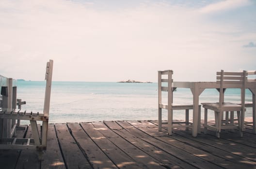 Wood dock White chair and table in Koh Samet Thailand vintage