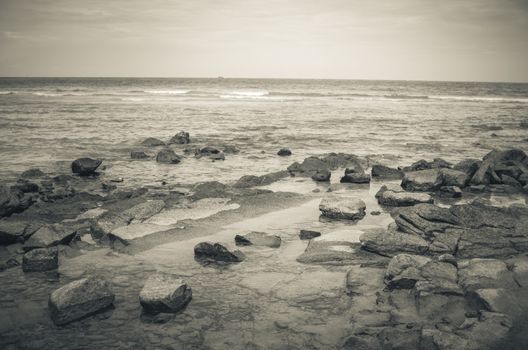 Beach rock and blue sea in Thailand vintage