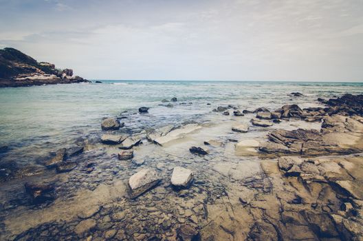 Beach rock and blue sea in Thailand vintage