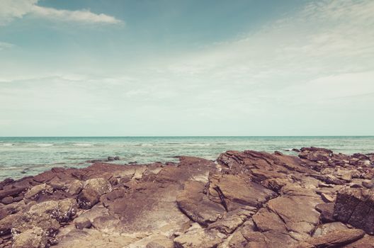 Beach rock and blue sea in Thailand vintage