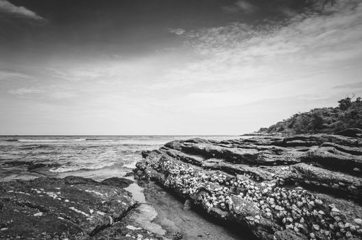 Beach rock and blue sea in Thailand vintage