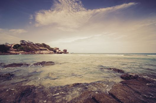 Beach rock and blue sea in Thailand vintage