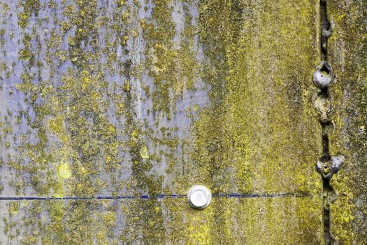 scratched and rusty yellow metal surface as background