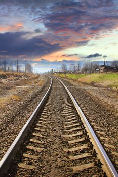 Railroad track disappearing into the distance.
