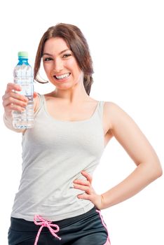 Girl and clean drinking water, studio shot