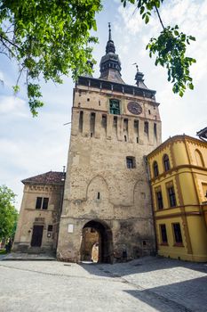 Sighisoara, Romania - June 23, 2013: Clock Tower typical roof and chemnee from Sighisoara fortress, Transylvania, Romania