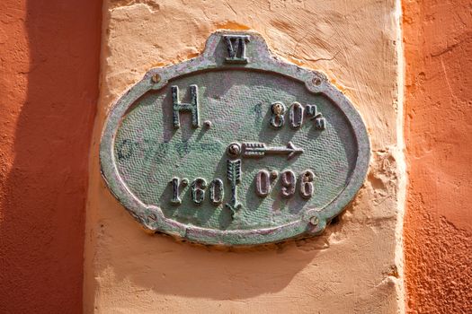 Sighisoara, Romania - June 23, 2013: Metal sign plates from an old house in Sighisoara, Transylvania, Romania