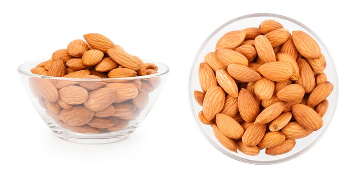 Dried almonds in a small glass bowl on white background, side and top view