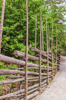 Traditional Swedish wooden fence in the country