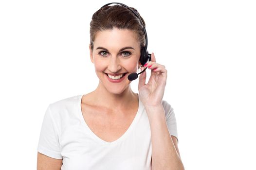 Female customer support staff posing to camera