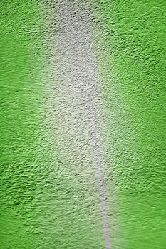 Green wall stucco background with gray line