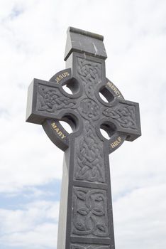 celtic cross head stone from a grave yard in ireland