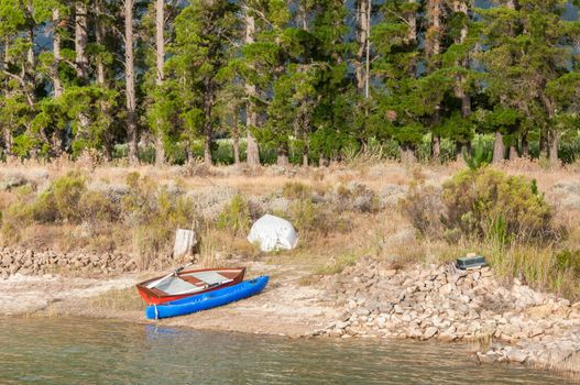 Canoe and rowing boats at a dam near Somerset West in the Western Cape Province of South Africa