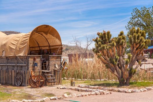 wooden horse barn with blue sky on American ranch. Nevada. USA