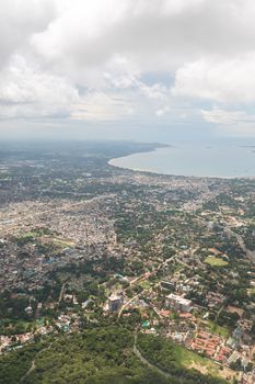 Aerial view of the city of Dar Es Salaam along the shores of the Indian Ocean showing the densely packed buildings