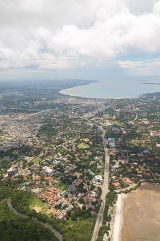 Aerial view of the city of Dar Es Salaam along the shores of the Indian Ocean showing the densely packed buildings