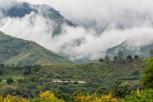 Moving clouds covering the Uluguru Mountains in the city of Morogoro, Eastern Region of Tanzania, Africa.