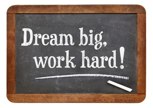 Dream big, work hard! Motivational words on a vintage slate blackboard