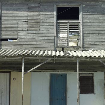 Run down apartment building in a tropical location 