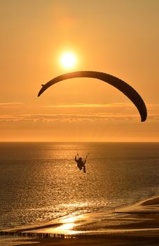 Parapending on the beach of Zoutelande, the only south beach of the Netherlands