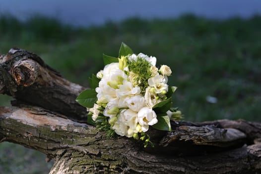 Wedding white bridal bouquet on nature in summer