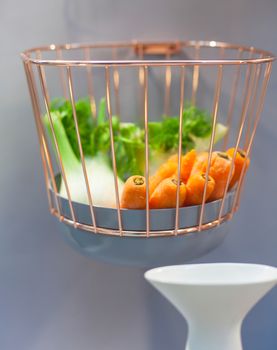 View of Fennels and carrots inside the iron basket