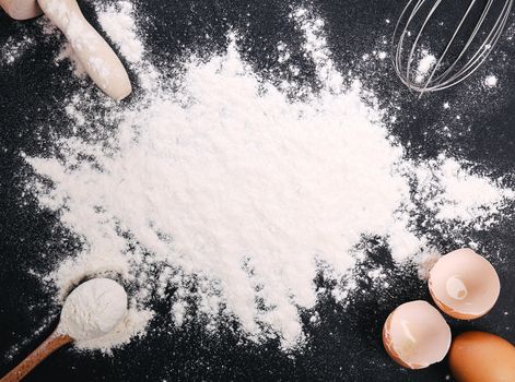 Kitchen, cuisine. Dough and eggs on the table