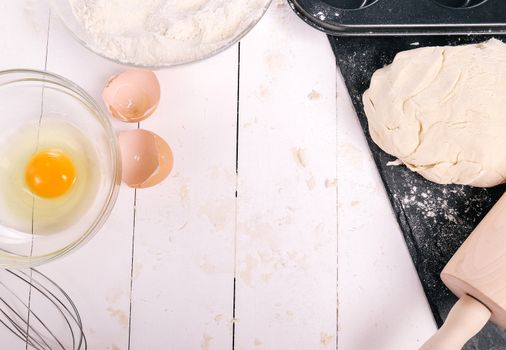 Kitchen, cuisine. Dough and eggs on the table