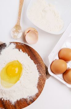 Kitchen, cuisine. Dough and eggs on the table