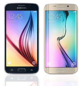 Galati, Romania - March 24, 2015: Black Sapphire Samsung Galaxy S6 and Gold Platinum Samsung Galaxy S6 Edge on white background. The telephone is supported with 5.1" touch screen display and 1440 x 2560 pixels resolution.  The Samsung Galaxy S6 and was S6 Edge launched at a press event in Barcelona on March 1 2015.